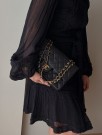 Chanel Double Flap Medium (1996) – ikonisk veske i sort lammeskinn thumbnail