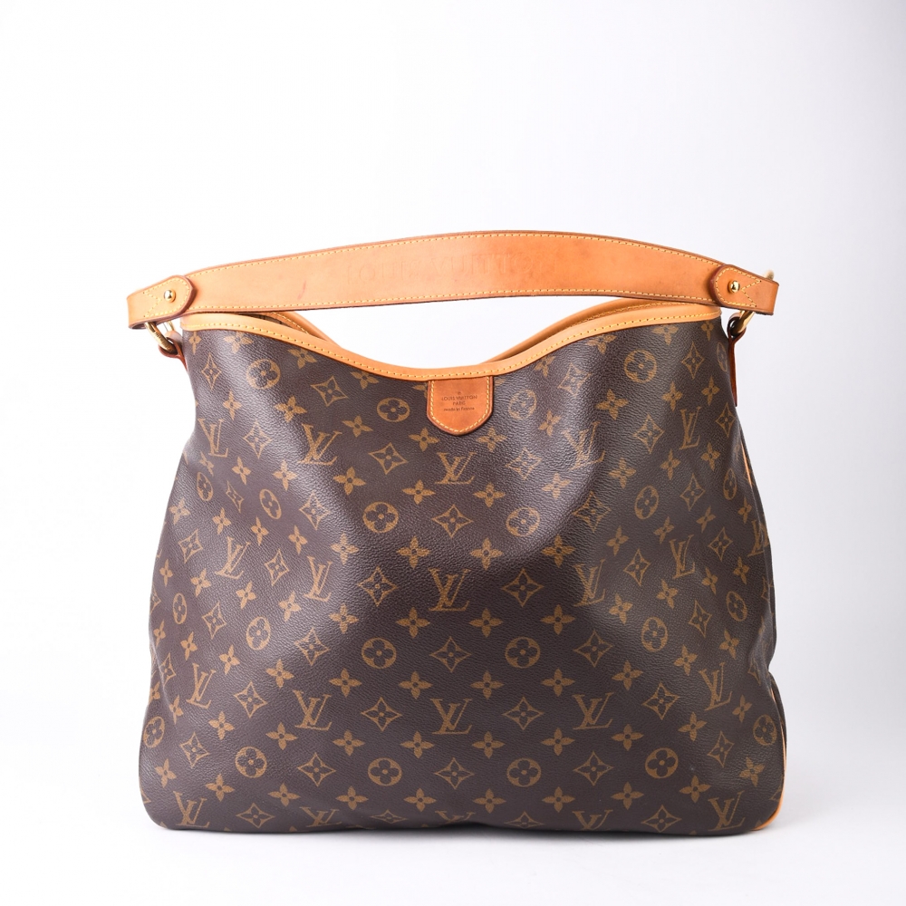 Delightful fra 2010 med nytt skinn og ikonisk monogram. Komfortabel og romslig veske med autentisitetsbevis og Retrading dustbag. Perfekt til hverdagsbruk!